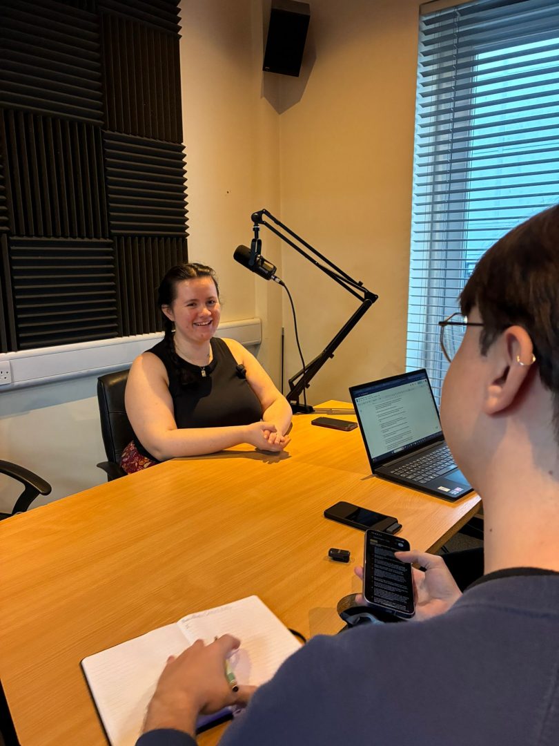 Maria Pollard discussing with Aneurin Davies and Ruaidhrí Gillen Lynch