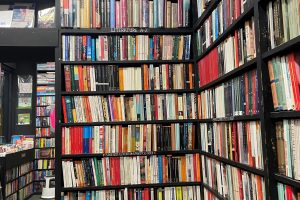 Large black shelves filled with books