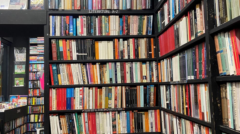 Large black shelves filled with books