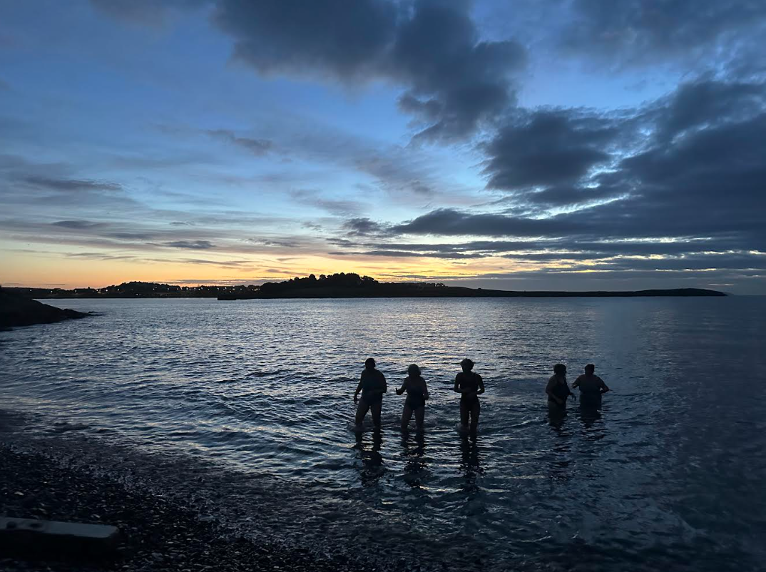 Water Dipping activity with friends at sunrise.