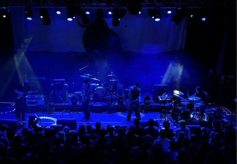 Permanent (Joy) on stage at The Great Hall