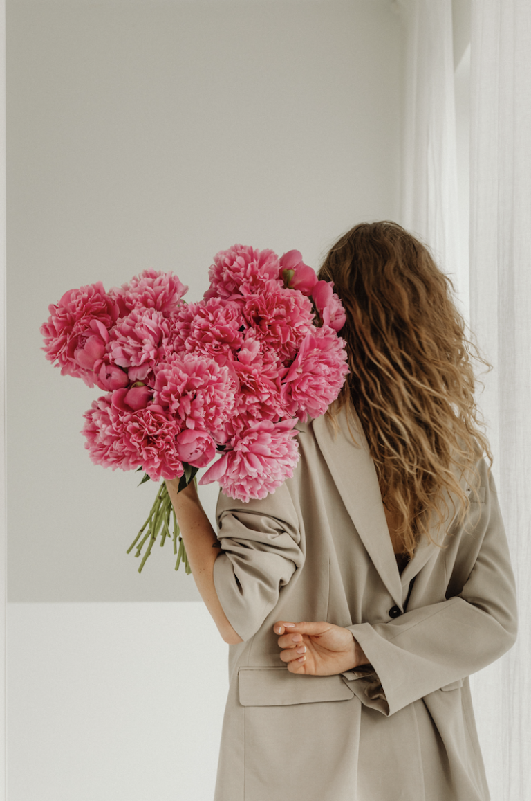 image of a girl with a bunch of flowers